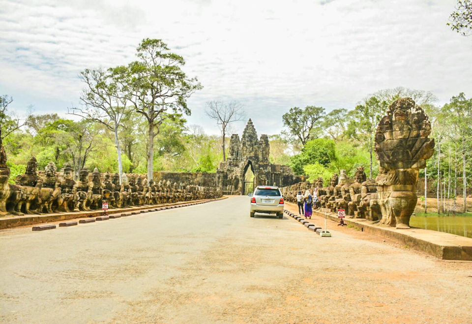 Gate to Angkor Thom or Angkor City - Asura and Deva statues holding Naga Serpent on both sides.