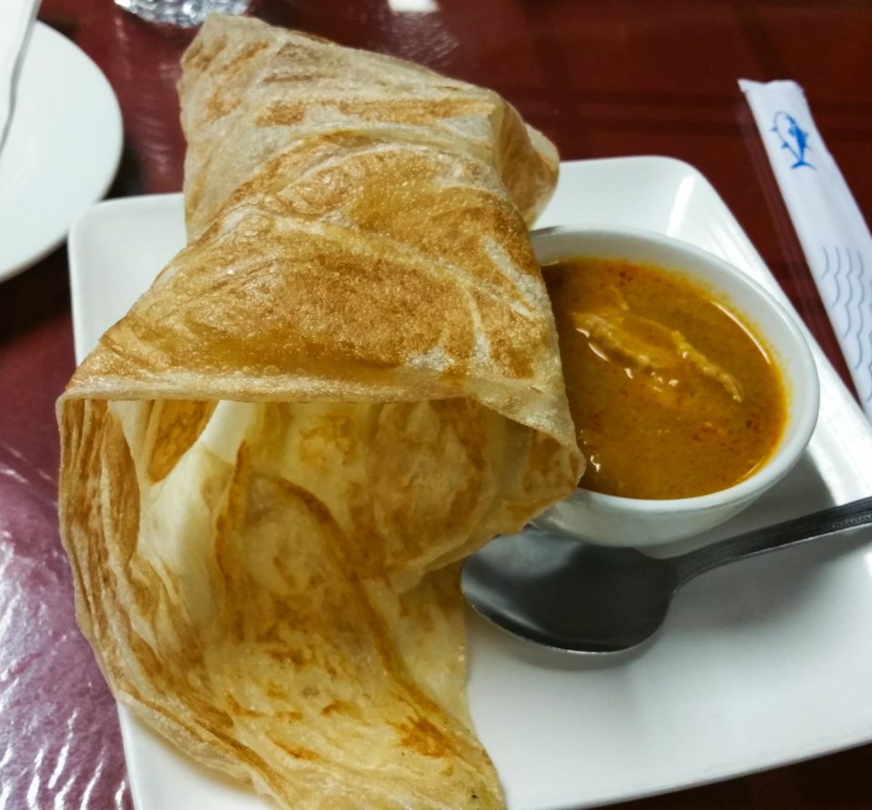 Indian influenced Malay dish - Roti Canai Indian influenced Malay dish - Roti Canai at Curry Leaves Malaysian Restaurant