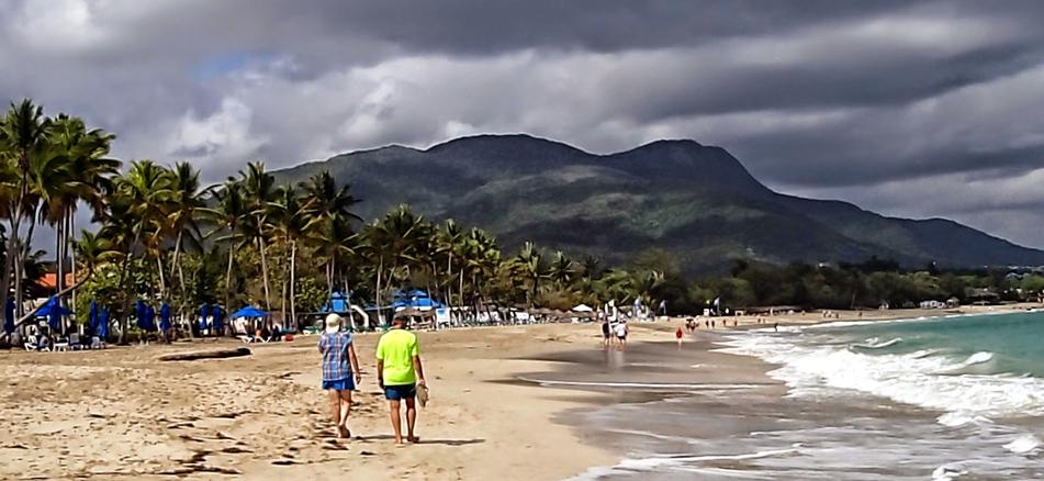 Playa Dorada Beach with its Golden sands and mountains on both sides