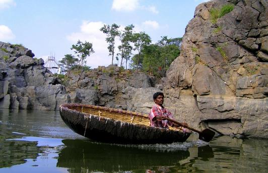 Indian Coracle called Parisal in Tamil Language with the boatman
