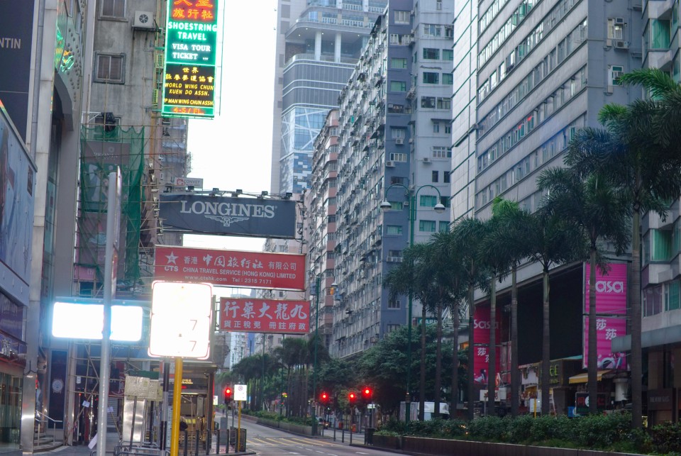 A view of Nathan Road with the ChungKing Mansions Entrance hidden partially on the right