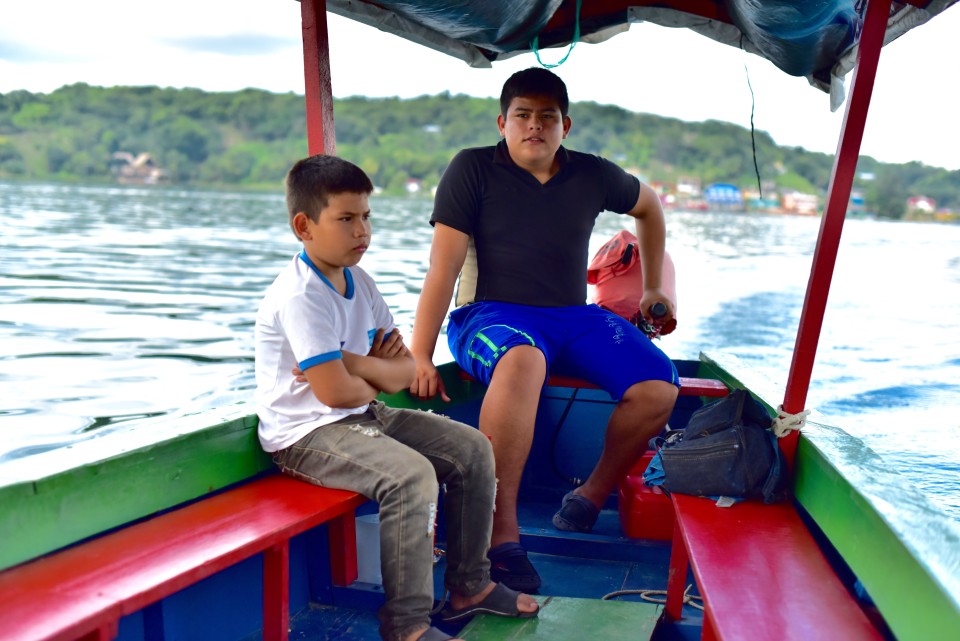 Kids were captaining the boat showing us around the Peten Itza lake 